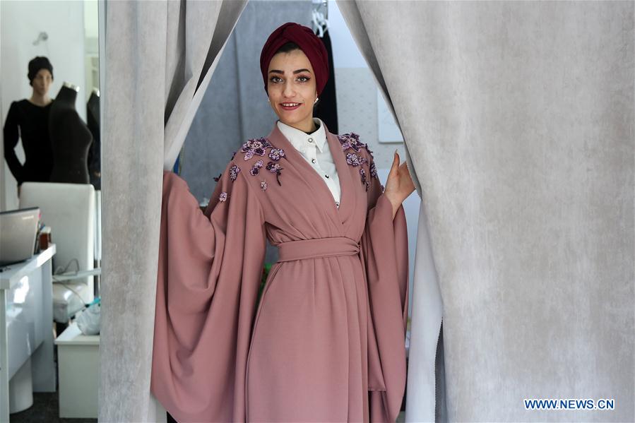 MIDEAST-GAZA-FASHION DESIGNER