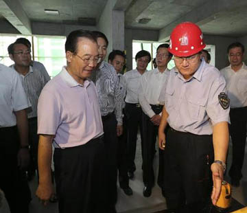 溫家寶:投入市場、群眾滿意是衡量保障性安居工程進展好壞最重要的標準