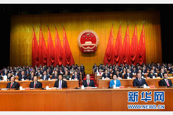 10月1日，慶祝中華人民共和國成立66周年暨新疆維吾爾自治區(qū)成立60周年大會在新疆人民會堂隆重舉行。 新華社記者 饒愛民 攝