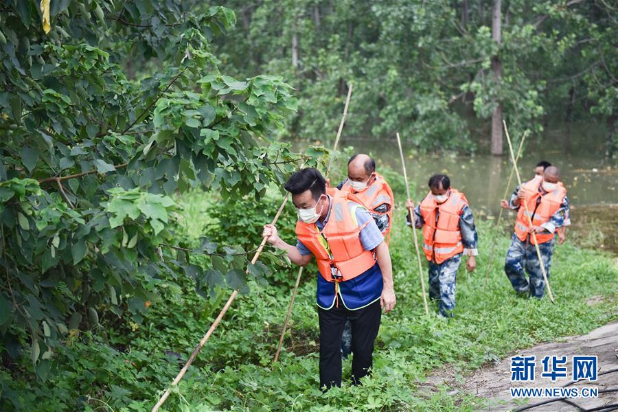 （在習近平新時代中國特色社會主義思想指引下&mdash;&mdash;新時代新作為新篇章&middot;習近平總書記關切事&middot;圖文互動）（2）戰疫魔,斗洪魔&mdash;&mdash;湖北全力應對防疫、防汛疊加&ldquo;雙考&rdquo;
