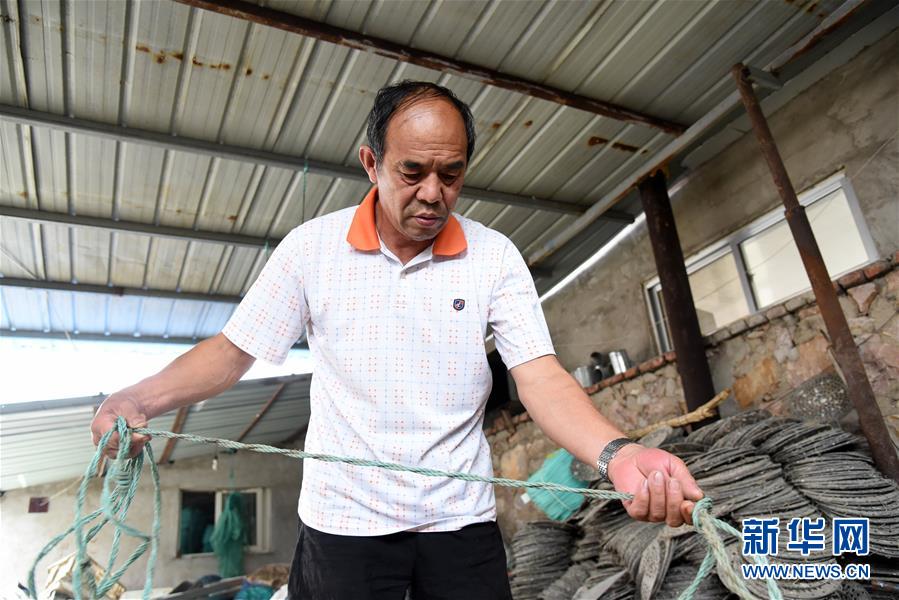 (走向我們的小康生活·圖文互動)(4)長島漁民的扇貝喜事:從請客求人買到供不應求