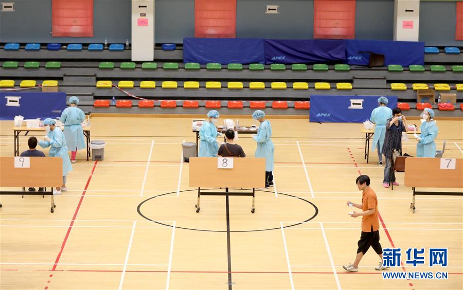 （圖文互動）（4）&ldquo;身為醫護人員一分子，應該出來幫忙&rdquo;&mdash;&mdash;參與新冠病毒社區檢測的香港醫護人員速寫