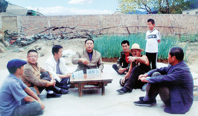 調(diào)解&ldquo;家長里短，雞毛蒜皮&rdquo;的小事情是李培斌從事的大事業(yè)