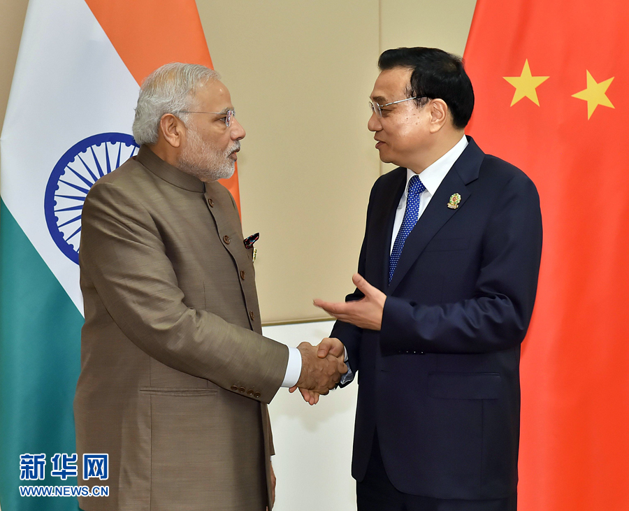 11月13日，中國國務院總理李克強在緬甸內比都會見印度總理莫迪。 新華社記者 李濤 攝