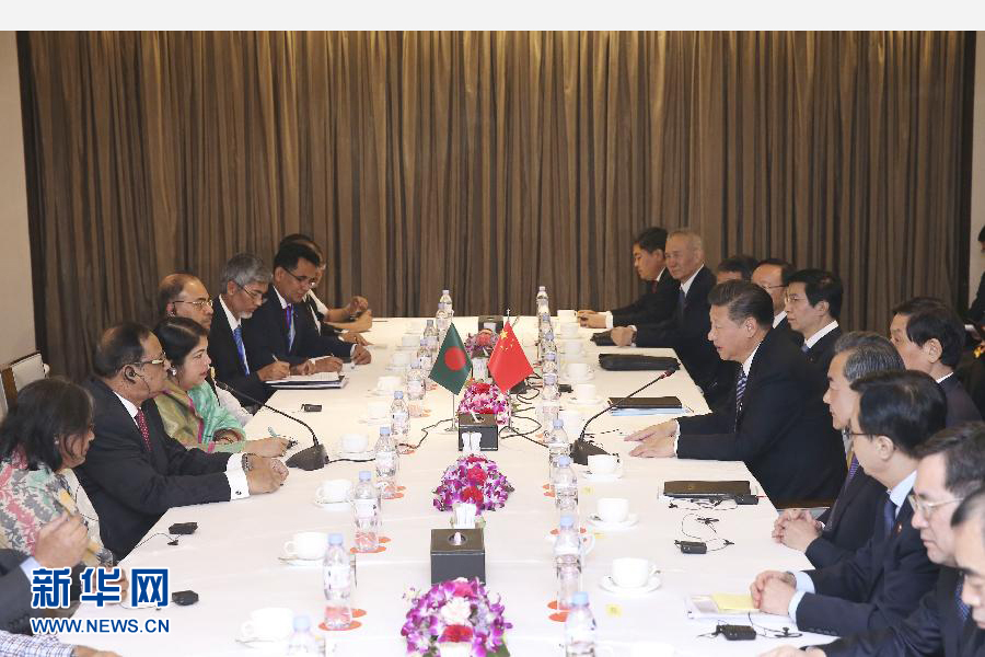10月14日，國家主席習近平在達卡會見孟加拉國國民議會議長喬杜里。 新華社記者龐興雷攝 