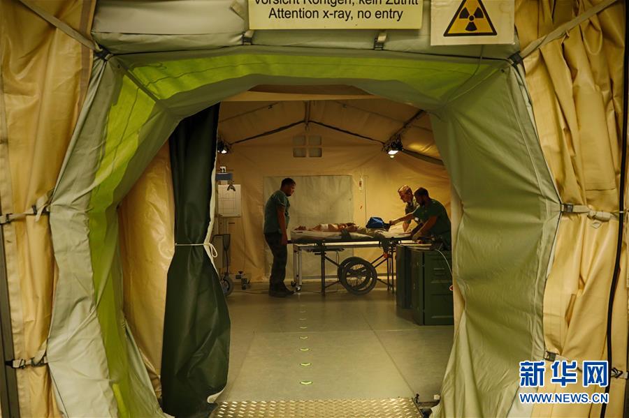 (國(guó)際·圖文互動(dòng))(1)“共同的理念,讓合作更深入更順暢”——走進(jìn)中德“聯(lián)合救援-2019”衛(wèi)勤實(shí)兵聯(lián)合演習(xí)德方野戰(zhàn)二級(jí)醫(yī)院