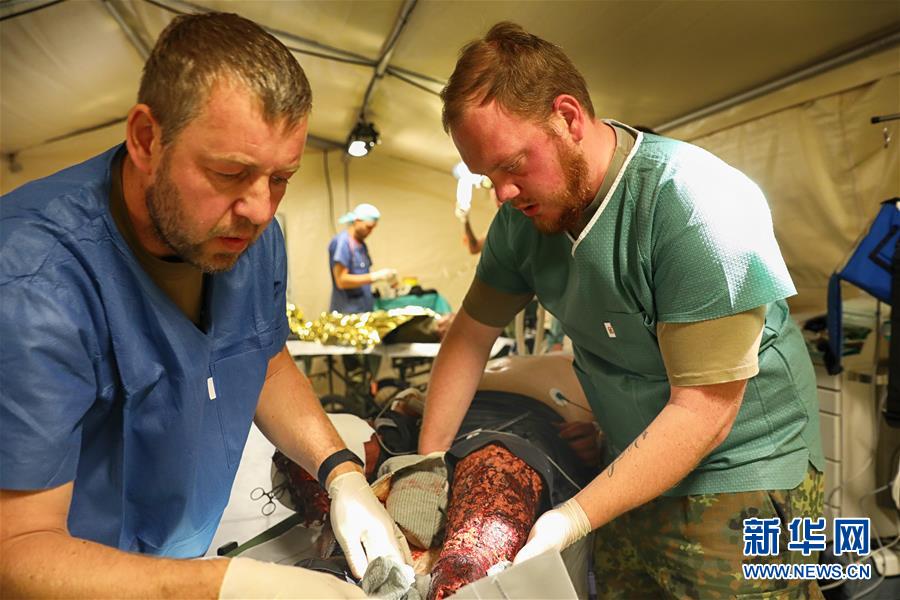(國(guó)際·圖文互動(dòng))(5)“共同的理念,讓合作更深入更順暢”——走進(jìn)中德“聯(lián)合救援-2019”衛(wèi)勤實(shí)兵聯(lián)合演習(xí)德方野戰(zhàn)二級(jí)醫(yī)院
