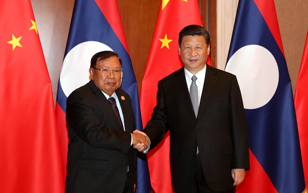習(xí)近平同老撾人民革命黨中央總書記、國家主席本揚(yáng)舉行會(huì)談